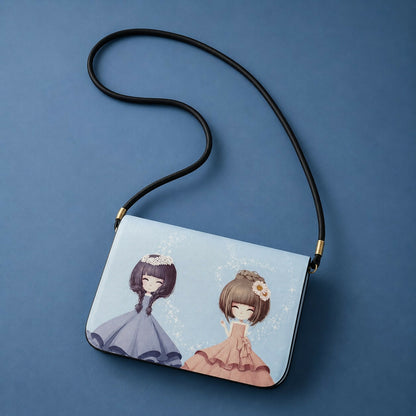 Compact blue sling bag with cartoon princess print