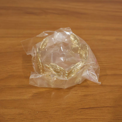 Elegant Korean floral bracelet with gold finish displayed