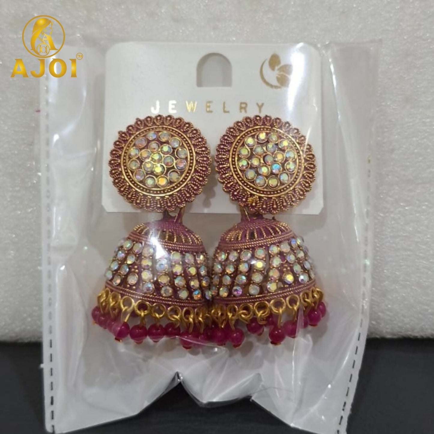 Elegant Pearl Studded Jhumka Earrings with Pink Beads Traditional