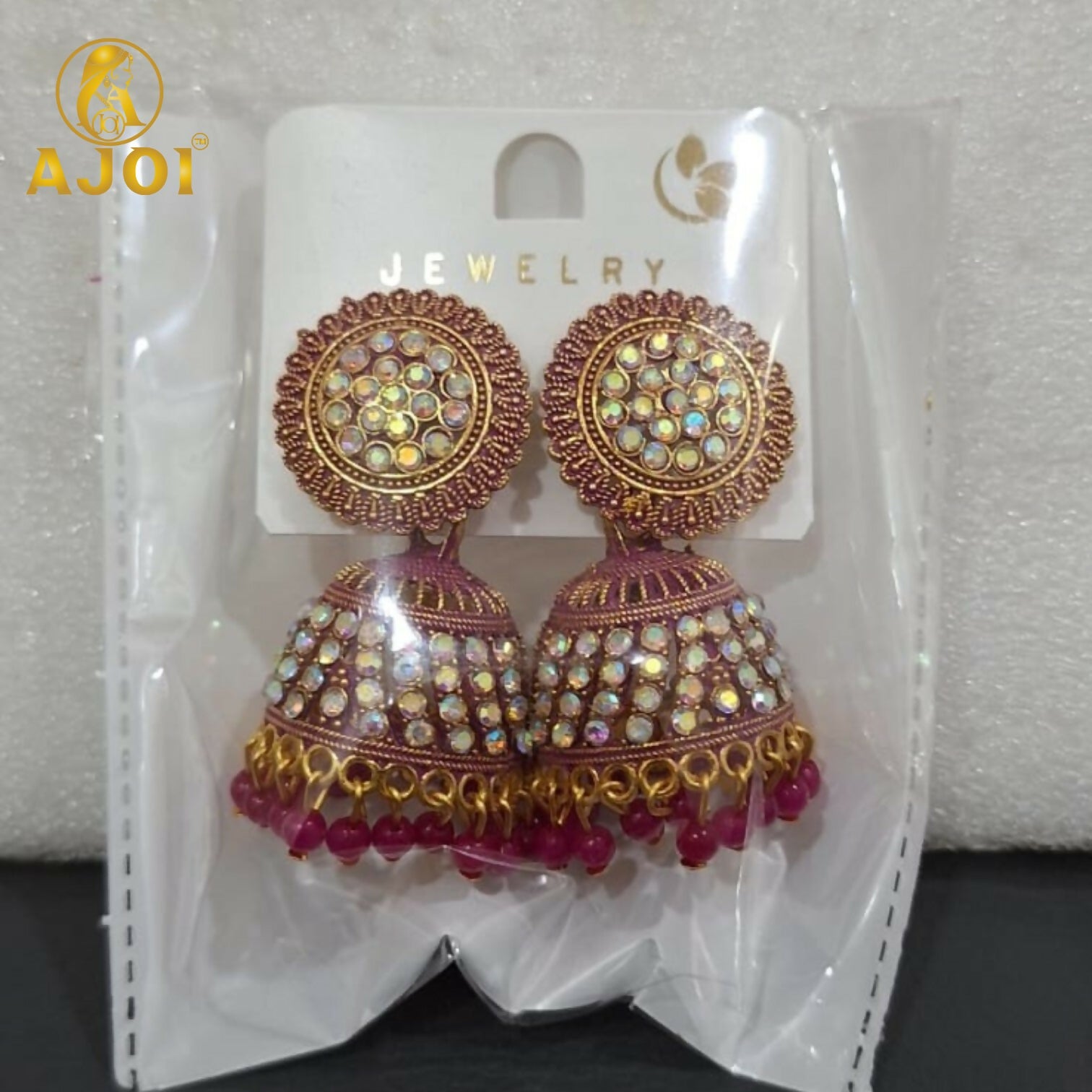 Elegant Pearl Studded Jhumka Earrings with Pink Beads Traditional
