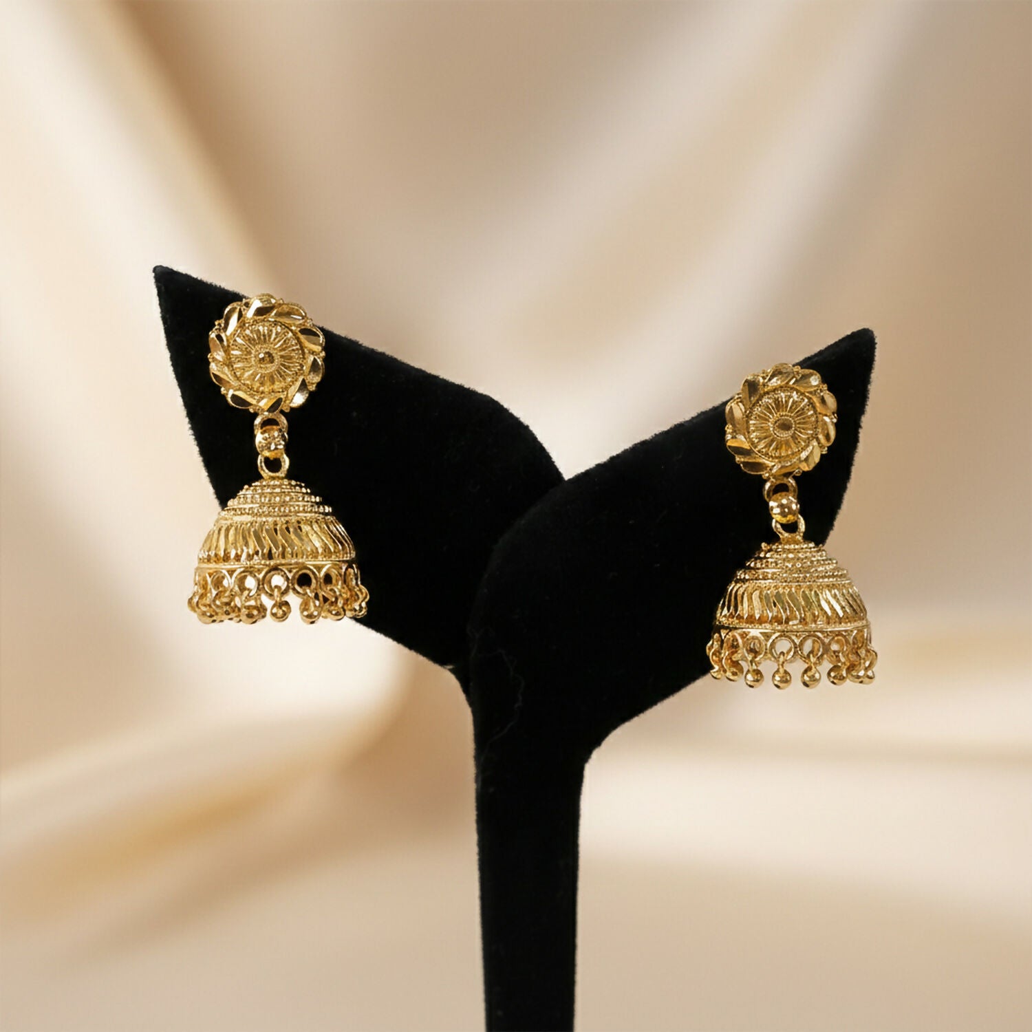 Traditional jhumka earrings styled with ethnic wear