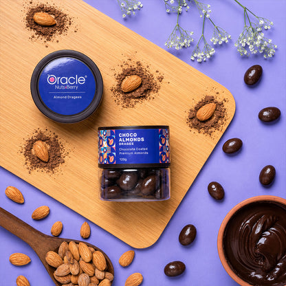 Yummy chocolate-covered almonds in elegant packaging for festivals