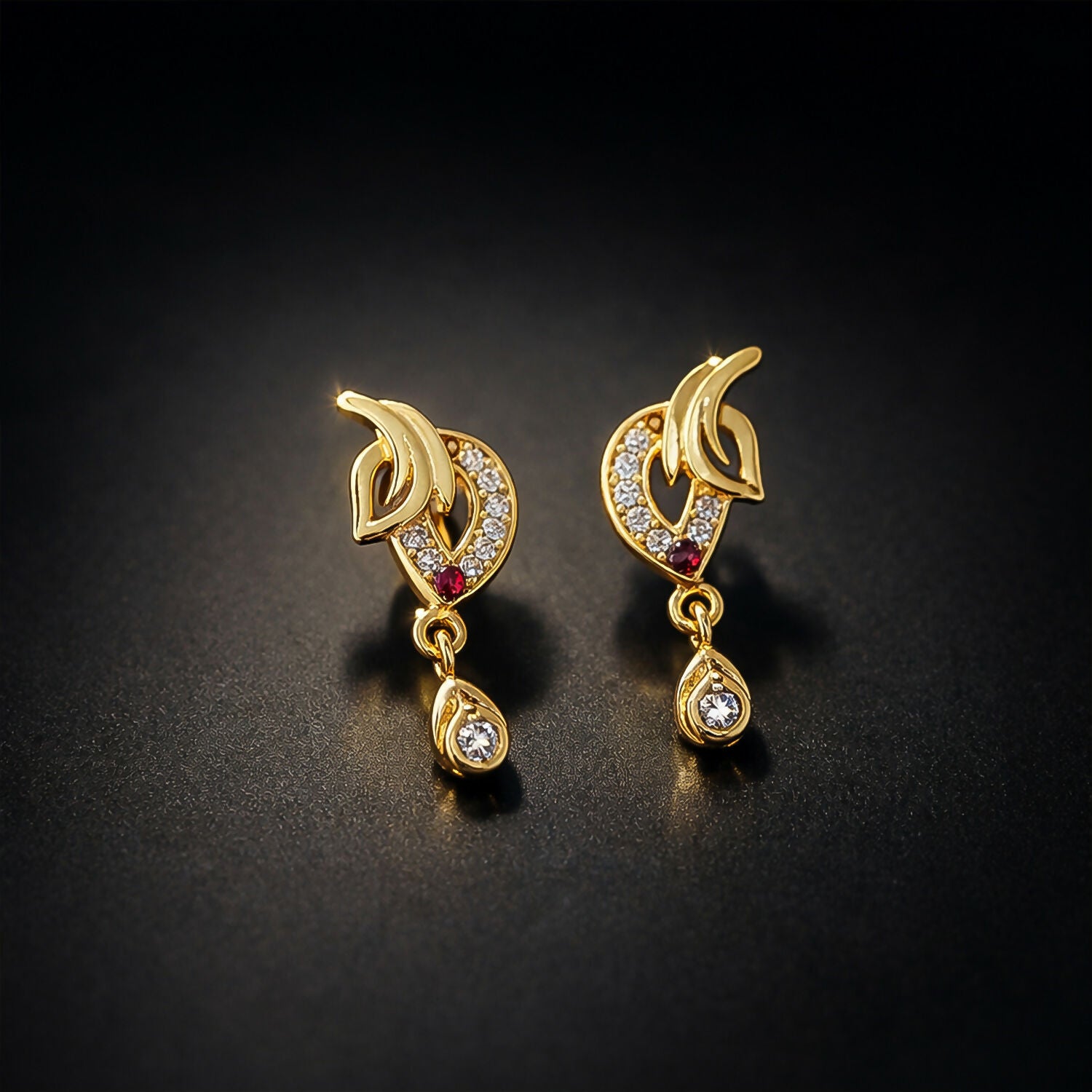 Luxury Curved Gold Earrings With Sparkling Stone Inlay And Elegant Drop Design