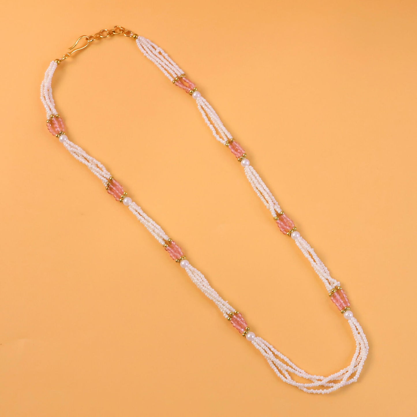 Pink segment accents on pearl beaded mala necklace, stylish jewelry