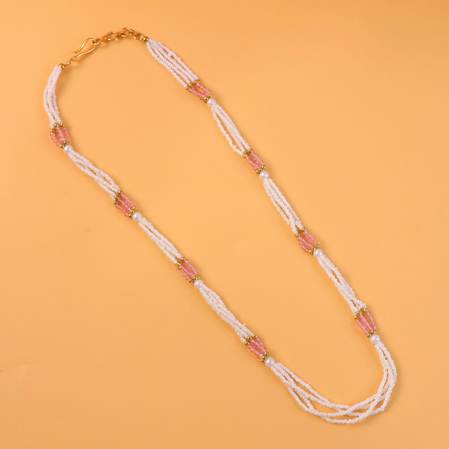 Pink segment accents on pearl beaded mala necklace, stylish jewelry