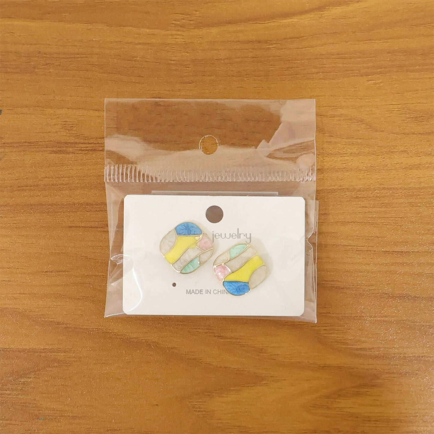 Modern enamel stud earrings for women with abstract design