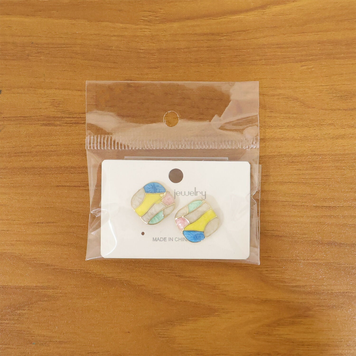 Modern enamel stud earrings for women with abstract design