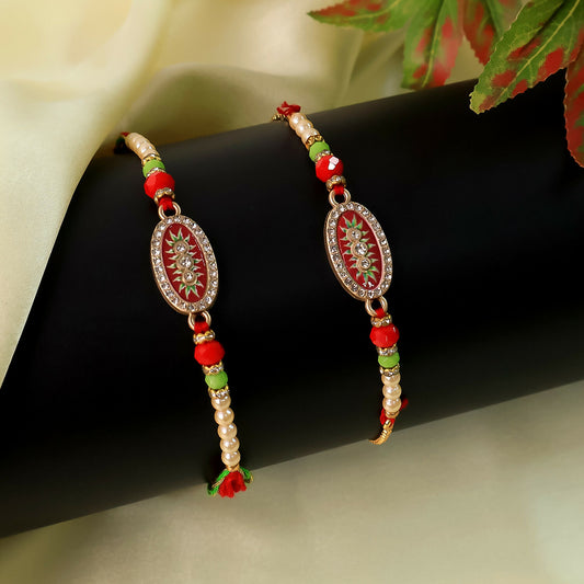 Elegant Bhaiya Bhabhi Rakhi Set with red oval dial and pearl beads