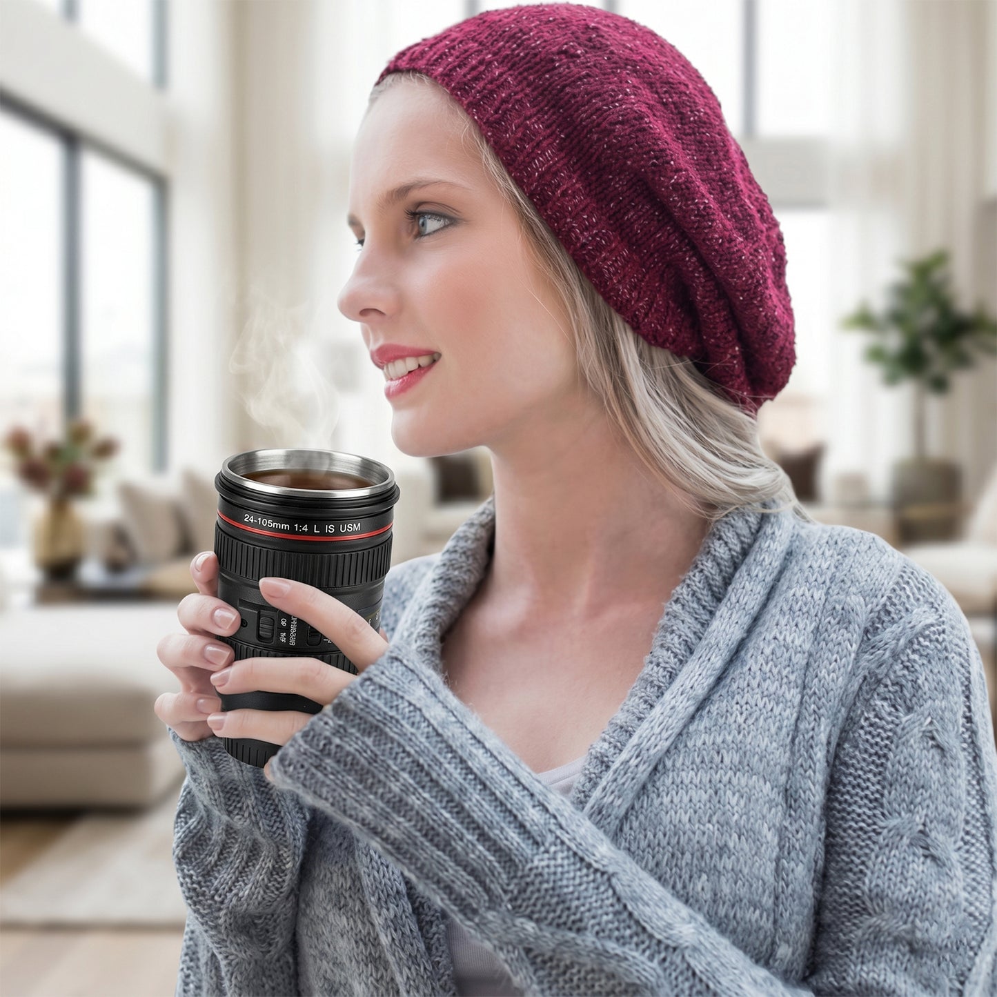 Camera lens coffee mug with its lid off, revealing the stainless steel interior.