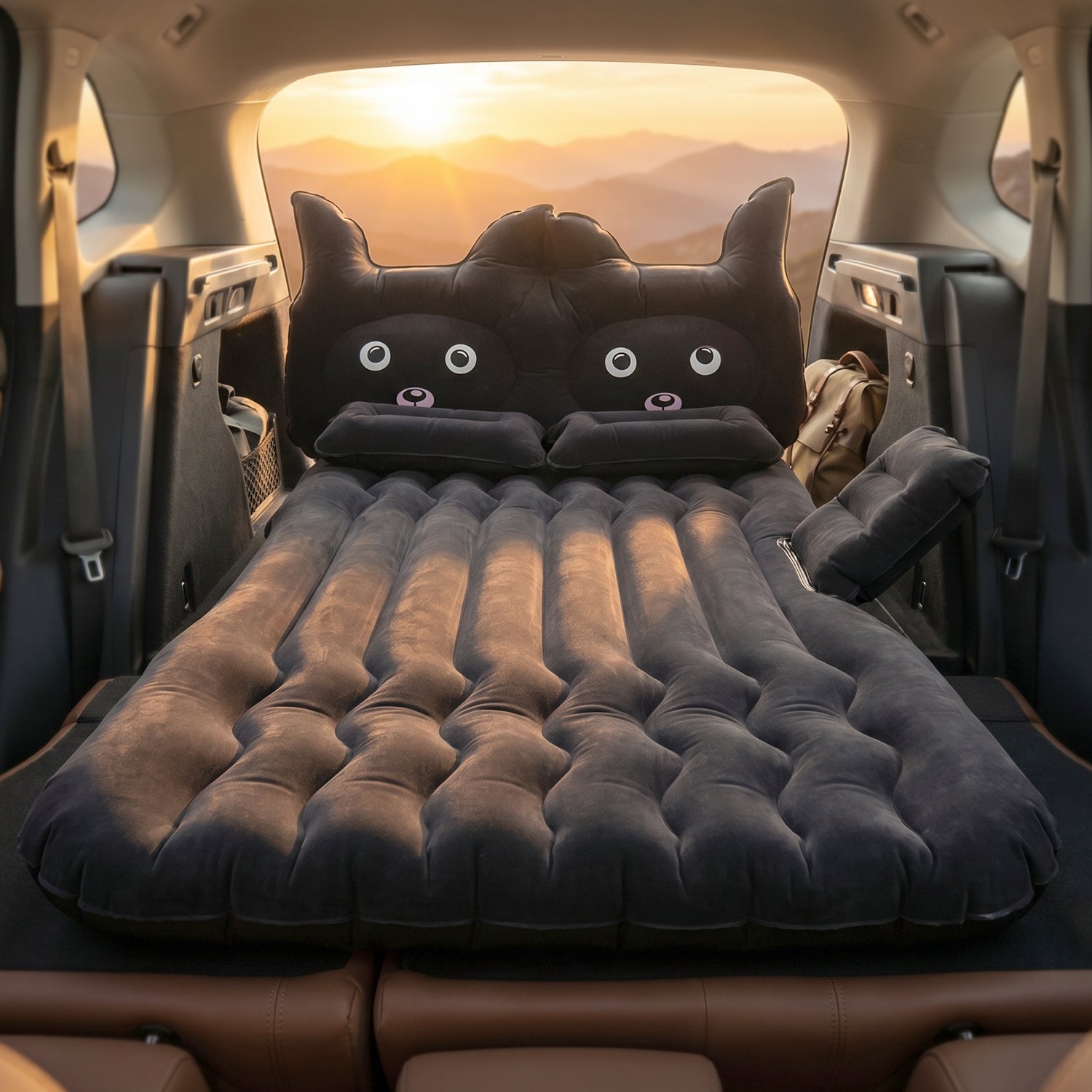 Black Cat Pillow on Inflatable Car Mattress