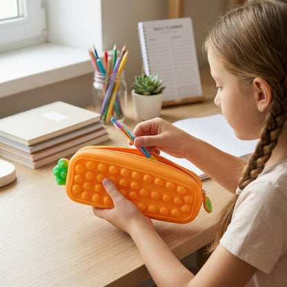 Silicone Pop It pencil pouch open with stationery inside