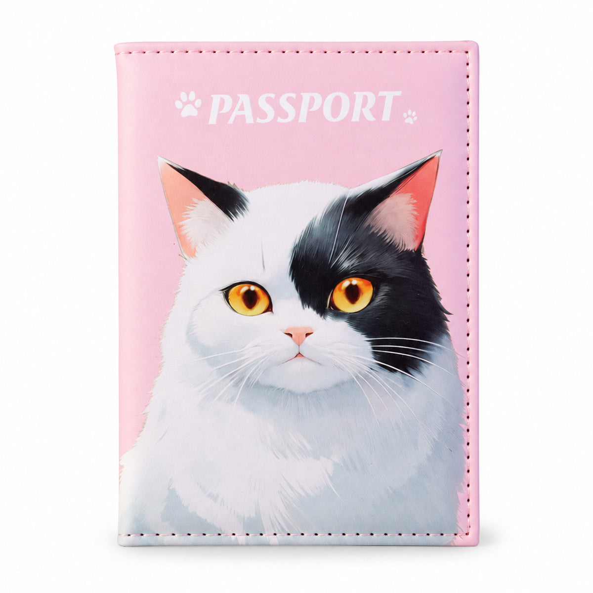 The pink passport holder, closed, features a prominent graphic of a white and black cat with striking amber eyes.