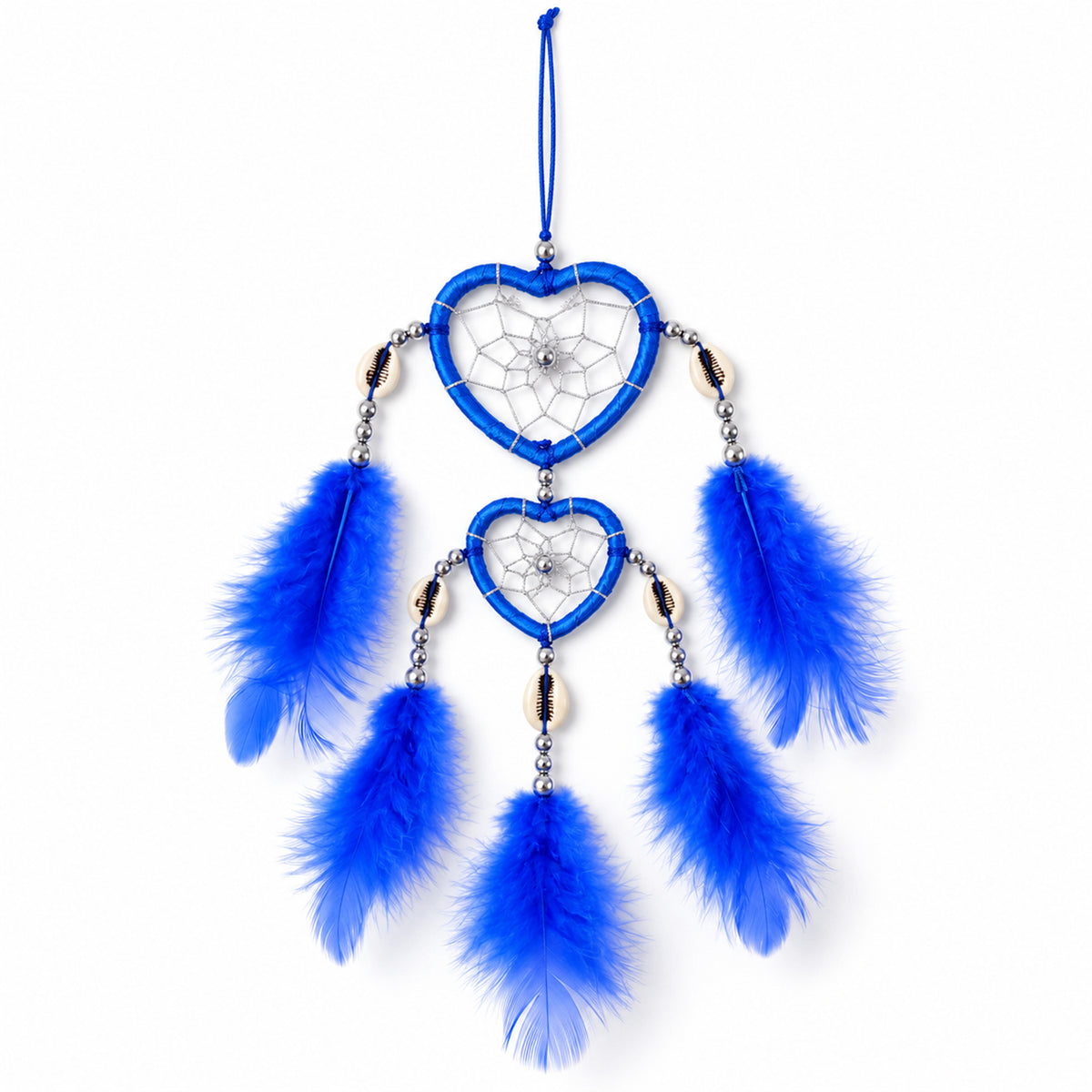 A blue heart-shaped dream catcher with feathers and silver beads hangs against a plain white background.