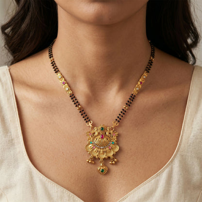 Detailed view of antique finish mangalsutra chain with black beads and bar links
