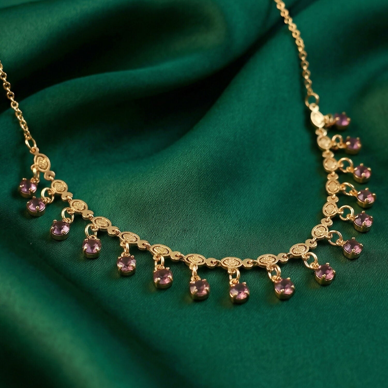 Fine craftsmanship detail of gold plated leaf design necklace