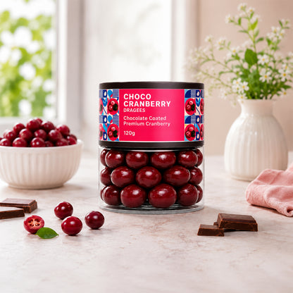 Arrangement of chocolate-coated cranberries with fresh cranberries.