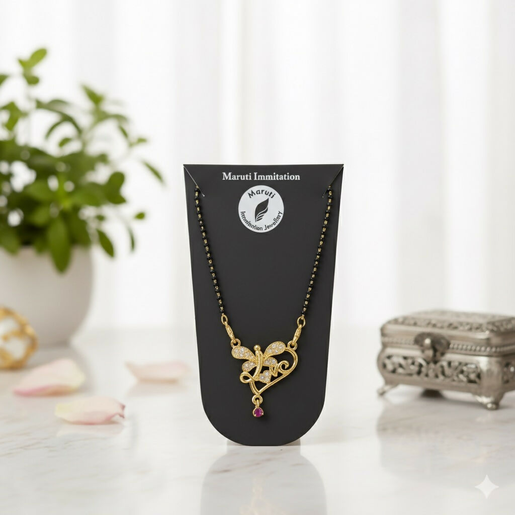 Gold-Toned Bird Design Mangalsutra with Stone-Studded Pendant and Pink Drop