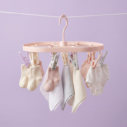 Strong spring-loaded plastic clips ideal for trousers, towels, and clothing accessories