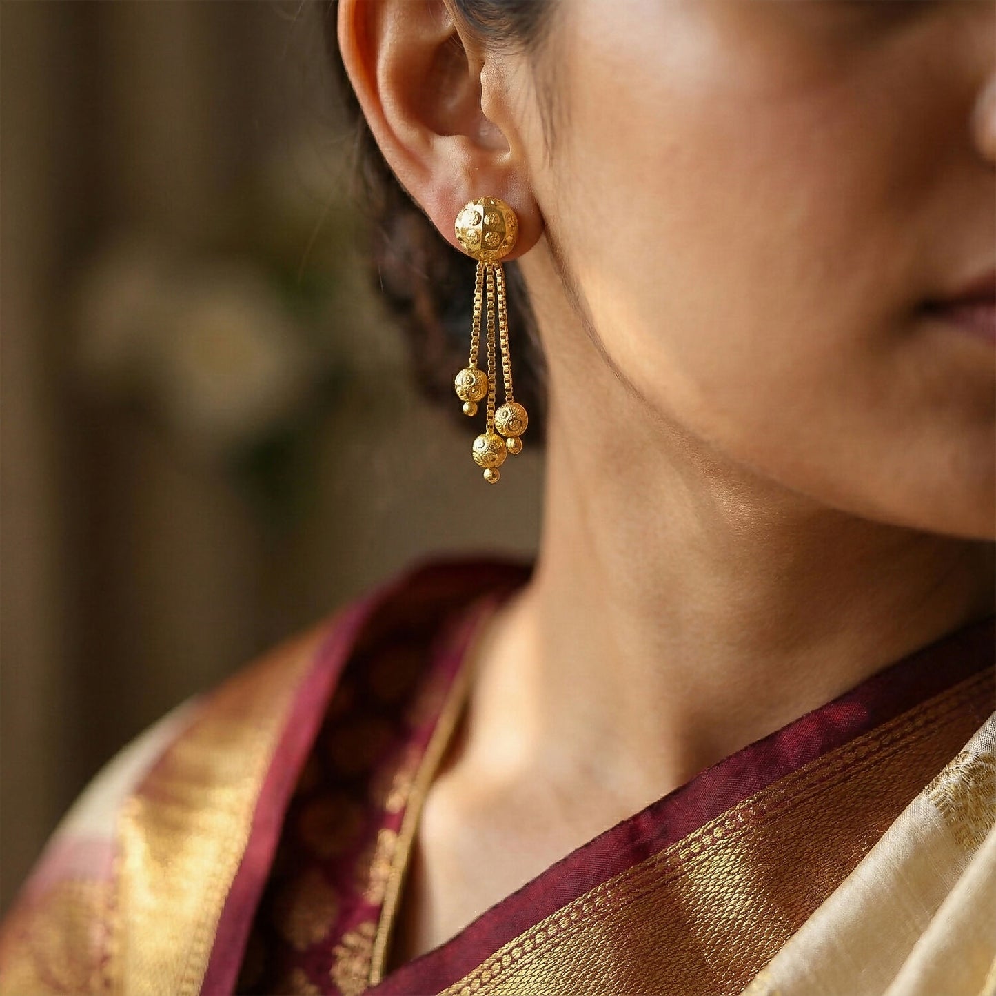 Gold Chain Tassel Style Earrings With Spherical Stud And Multi Strand Hanging Design