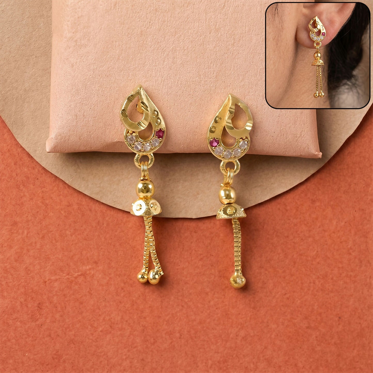 Traditional gold-plated long dangler earrings with white American Diamonds and ruby-red stone