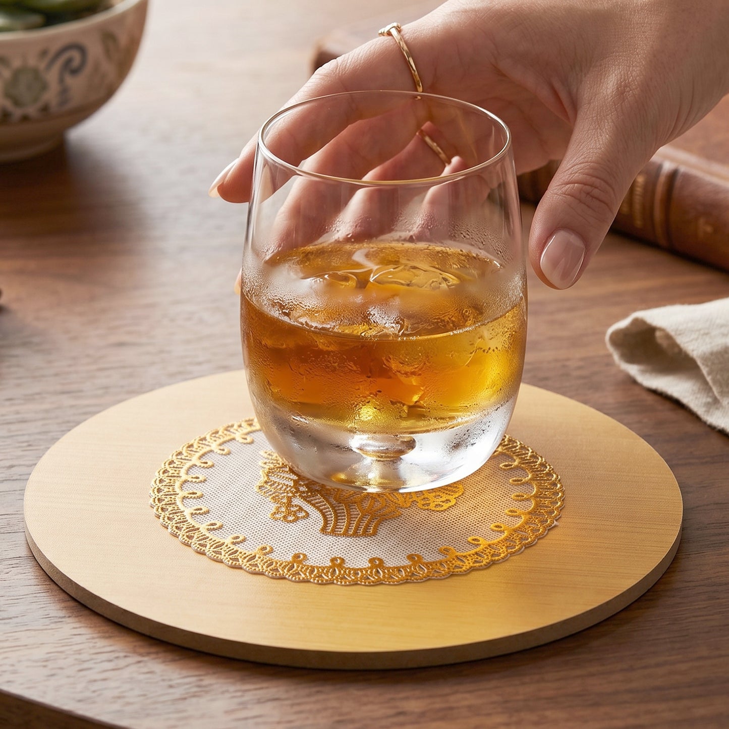 Side view of a round wooden heat-resistant coaster.