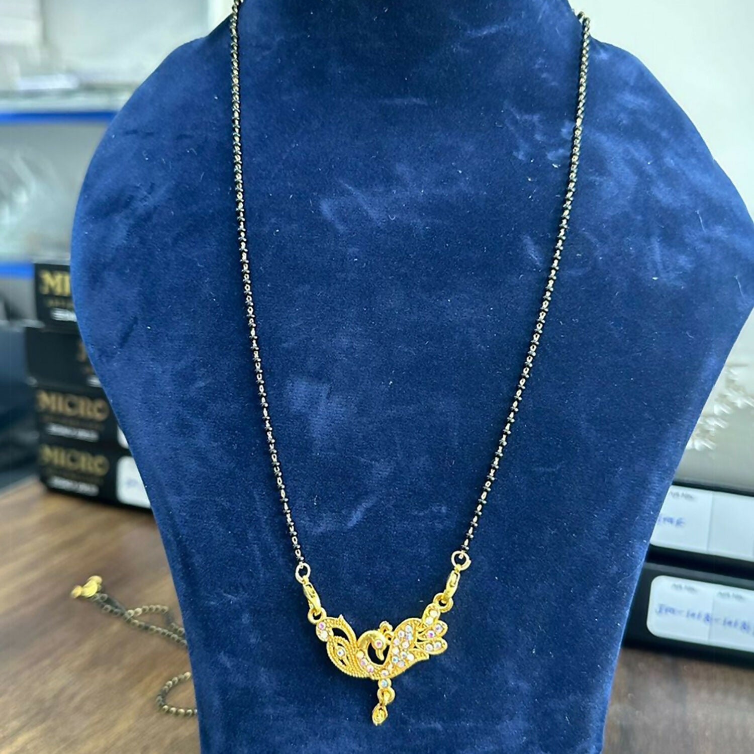 Stylish Gold-Toned Twin Swan Design Mangalsutra with Sparkling Stone Pendant