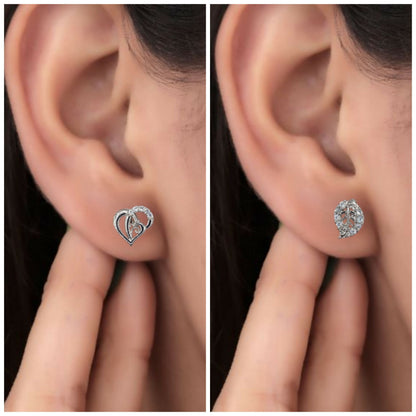 Close-up of silver-plated heart-shaped stud earrings with Cubic Zirconia stones