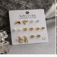 Roslynd 7-Pair Gold Tone Stud Earrings Set with Butterfly, Tulip, Pearl & Crystal Studs