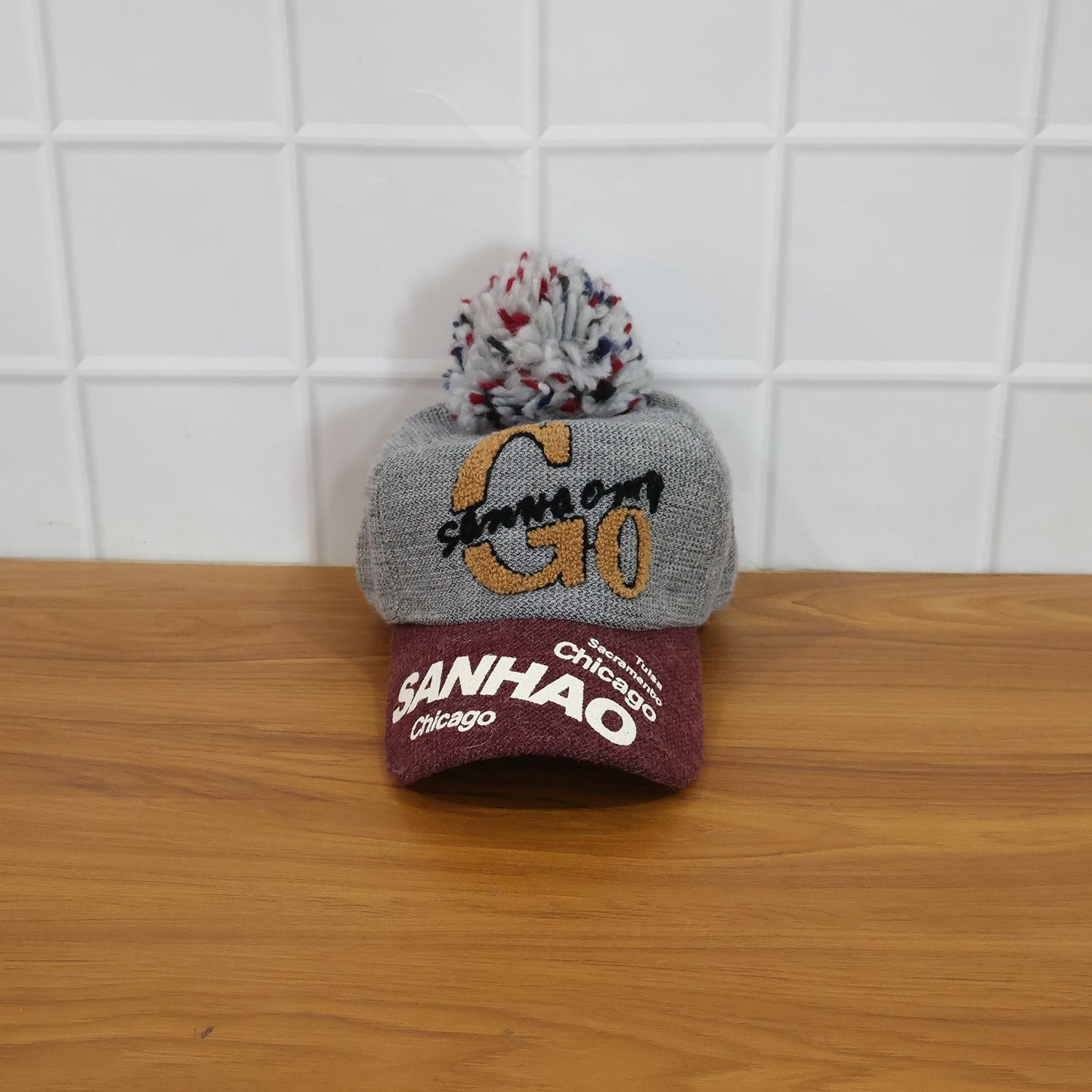 Lifestyle image of woman wearing woolen baseball cap