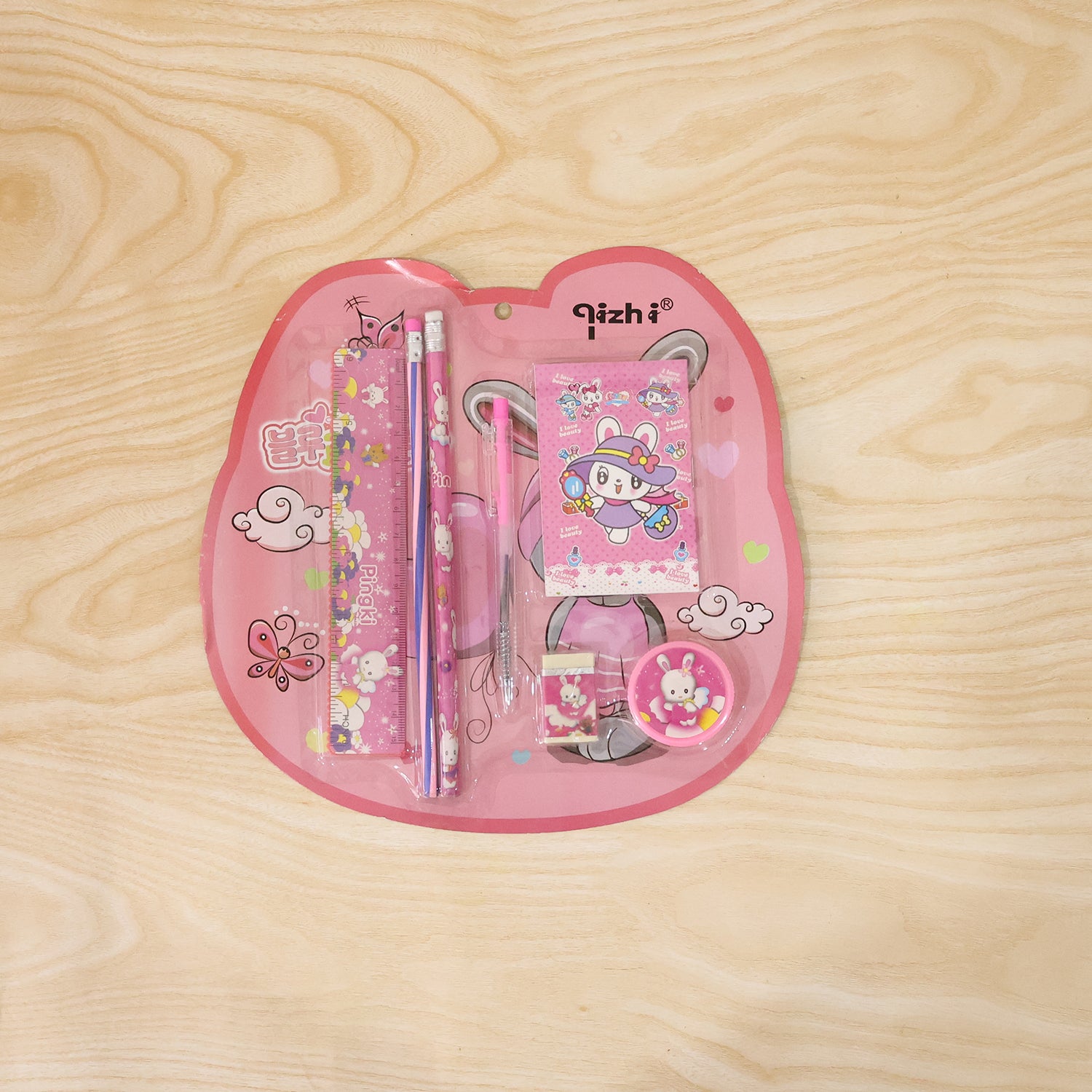 Pink kids stationery set displayed with all items
