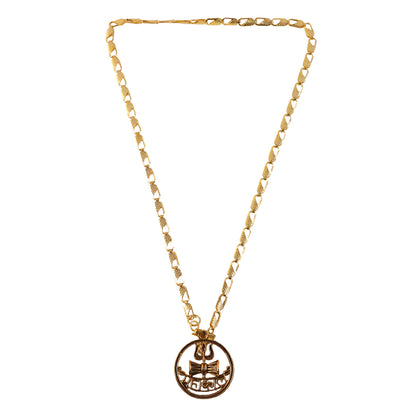 Close-up of gold Mahakal necklace showing detailed sacred symbols