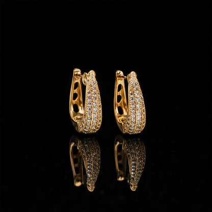 Elegant Curved Pavé Crystal Huggie Earrings in Gold Finish