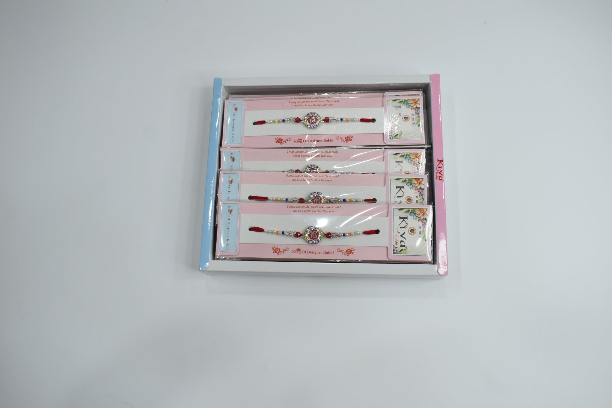 Combo Pack of 12 Om Rakhi with Colorful Stone Studs & Multicolor Beaded Threads – Festive Gift Box Edition