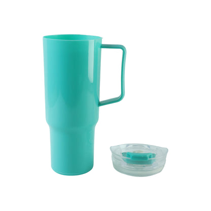 An aqua blue tumbler with a handle stands next to its clear lid on a plain white background.