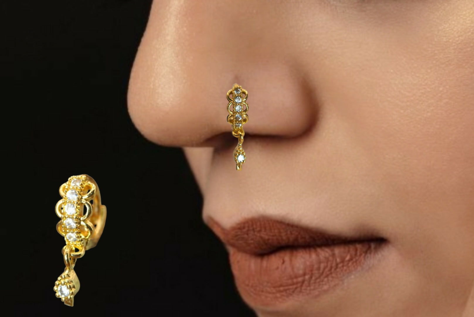 Close-up of gold plated CZ stone nosepin ring with delicate floral drop detailing