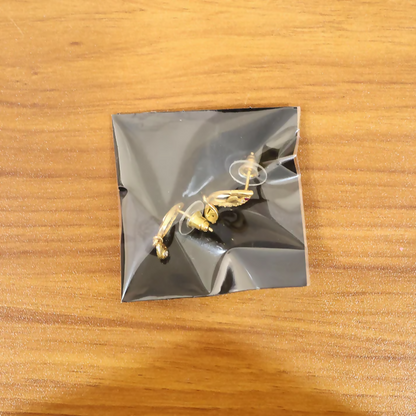 Heart Shaped Gold Finish Earrings With Crystal Border And Delicate Hanging Drop