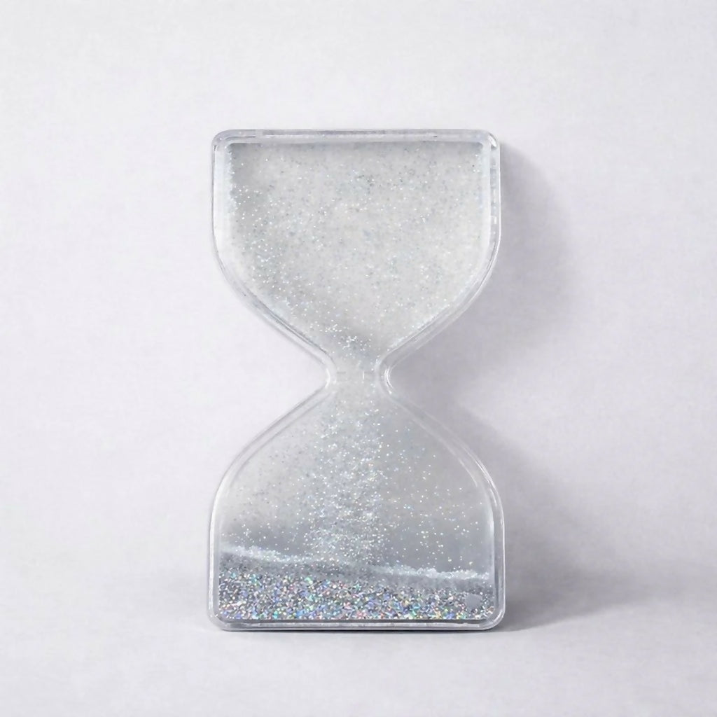 Silver liquid hourglass timer with shimmering particles