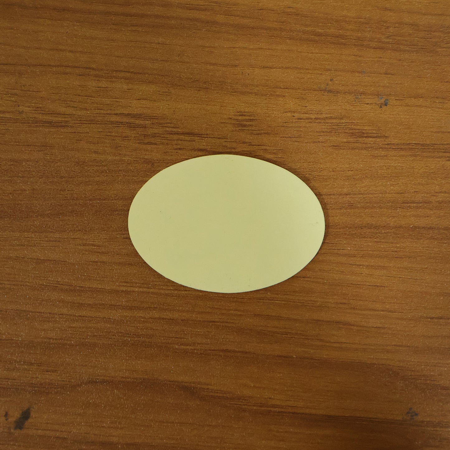 Round self adhesive anti-slip furniture pad on surface