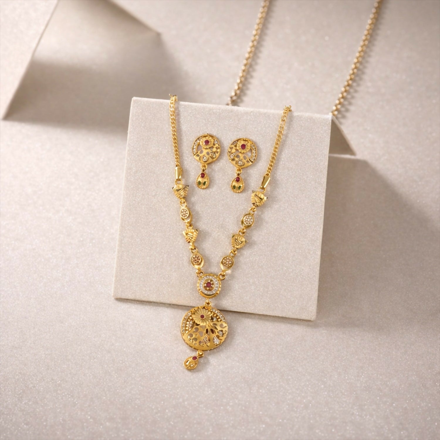Classic Gold-Tone Floral Engraved Pendant Necklace Set with Designer Stud Earrings