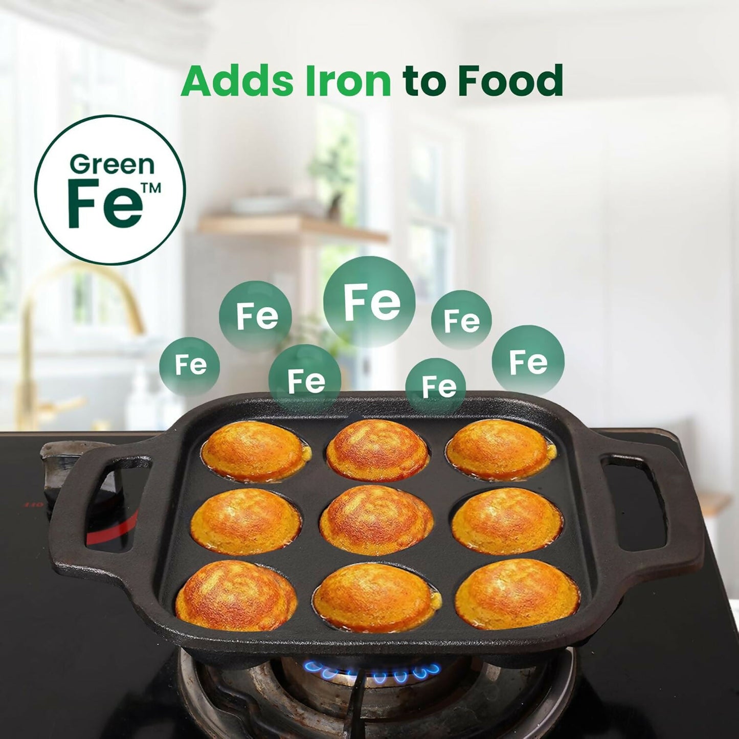 Top view of cast iron paniyaram pan with dual handles