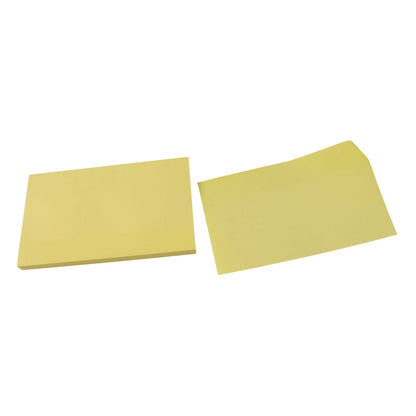 Strong adhesive backing on yellow sticky note sheet for secure sticking