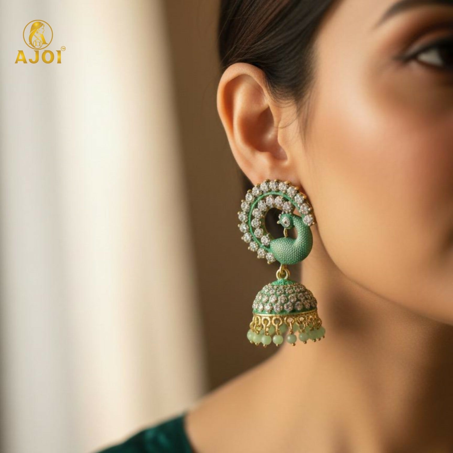 Side angle of mint green peacock stone jhumka earrings