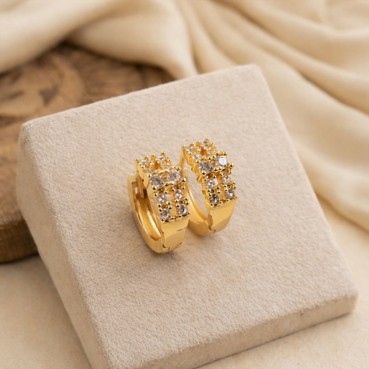 Stylish gold-tone crystal hoop earrings suitable for women