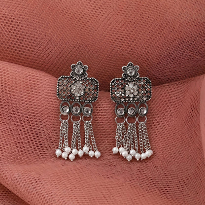 Necklace and earrings set styled with traditional attire