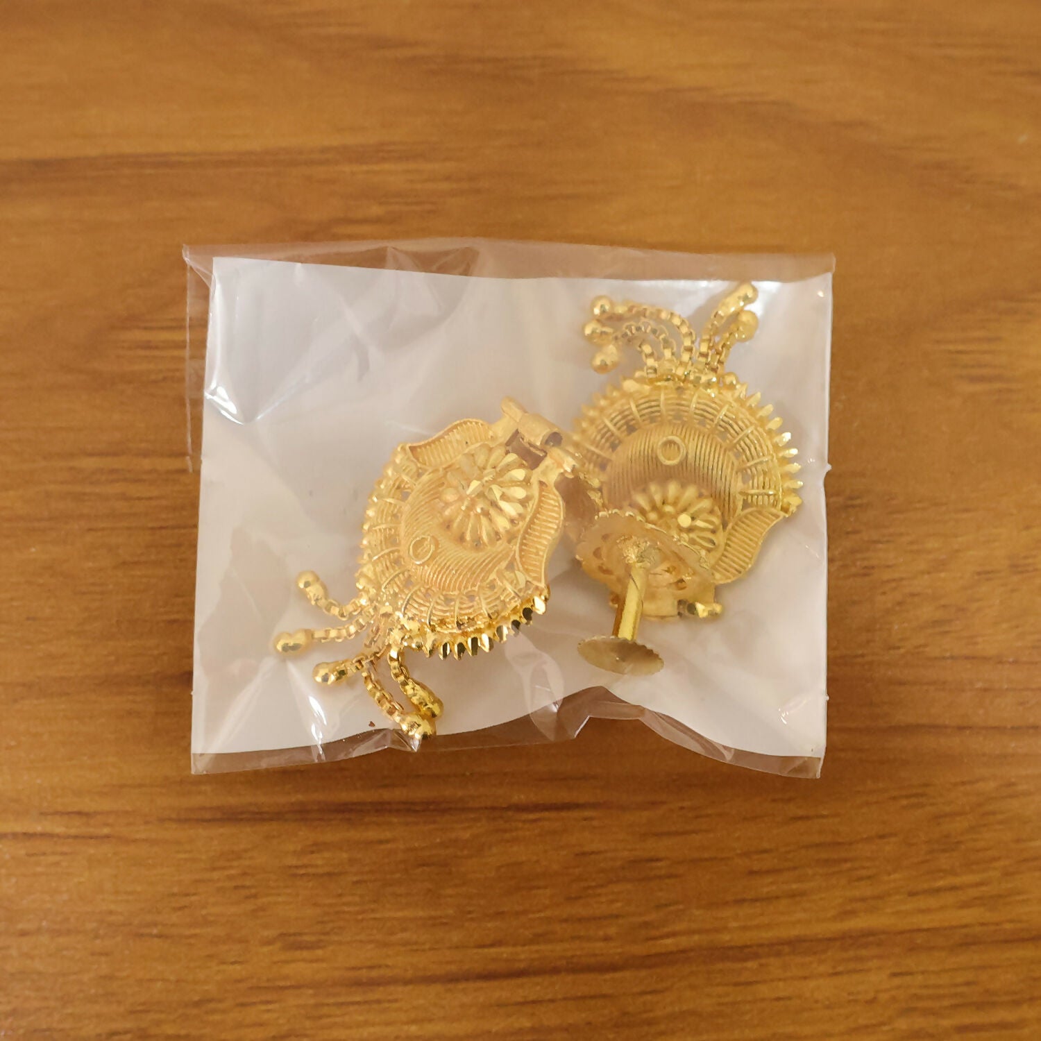 Handcrafted South Indian Heritage Gold Earrings with Intricate Leaf Motif and Classic Jhumka Dangles