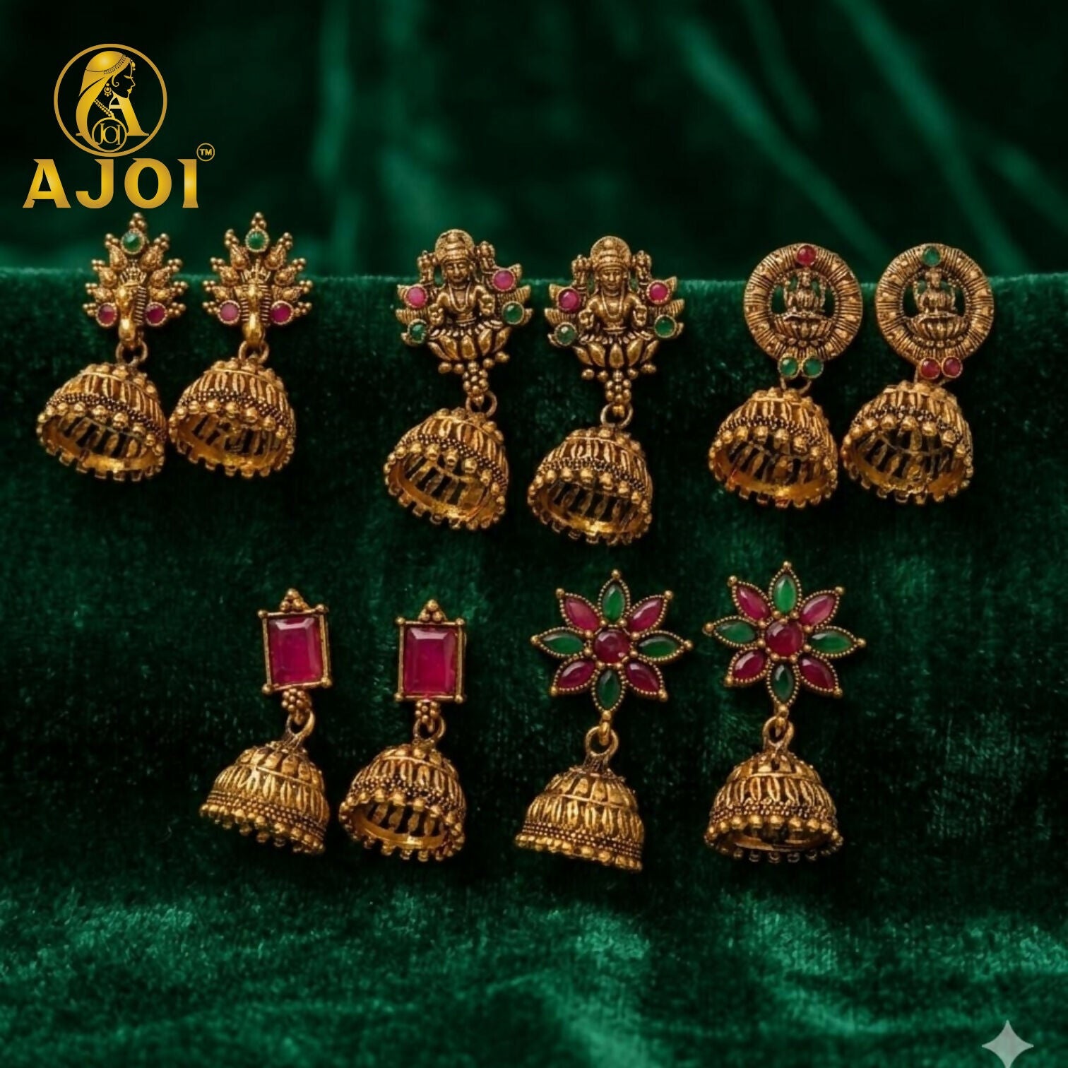 Side view of temple gold jhumka earring with ruby and emerald stones