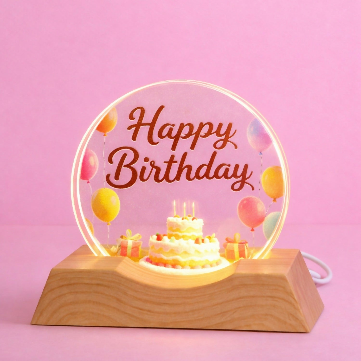 Close-up of birthday-themed acrylic lamp with LED lights