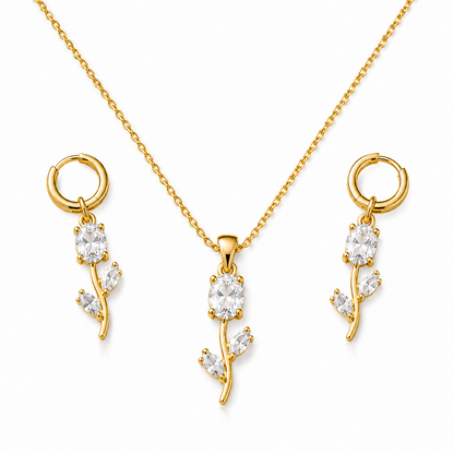 Elegant gold-plated white crystal necklace and earrings set showcasing the intricate floral design.