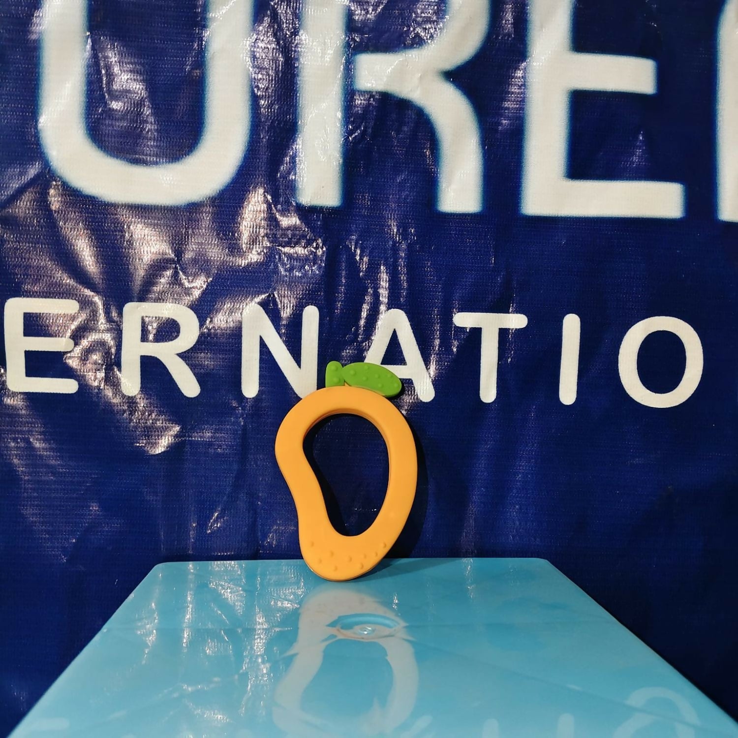 Mango-shaped silicone baby teether