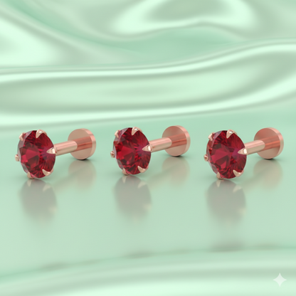 Set of three rose gold plated nosepin studs with radiant red crystals arranged